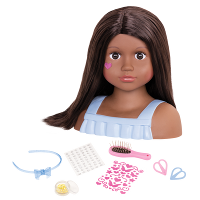 Brunette doll styling head with hair accessories