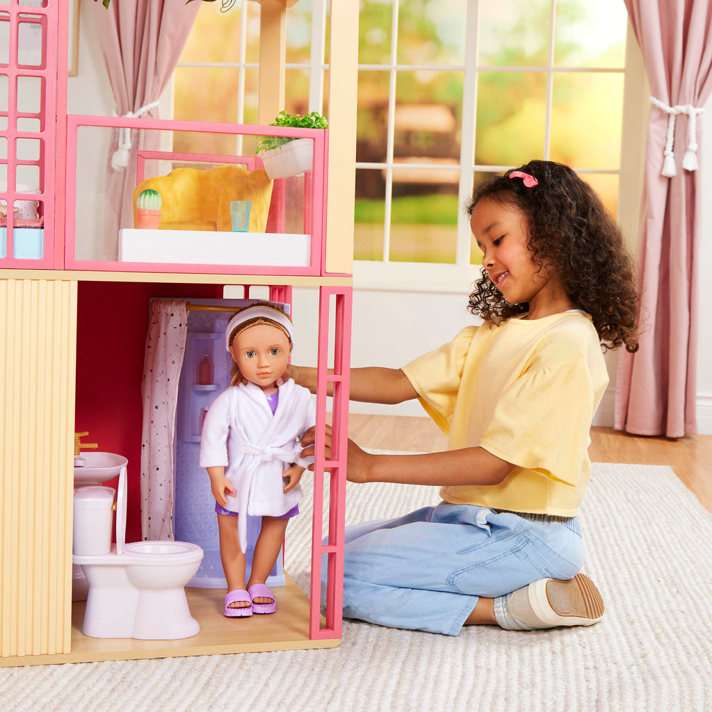 Our Generation spa playset with 18 inch doll with blond hair and hazel eyes
