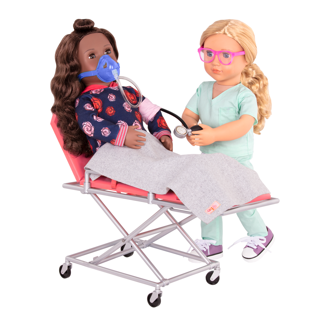 Two 18-inch dolls using ambulance gurney