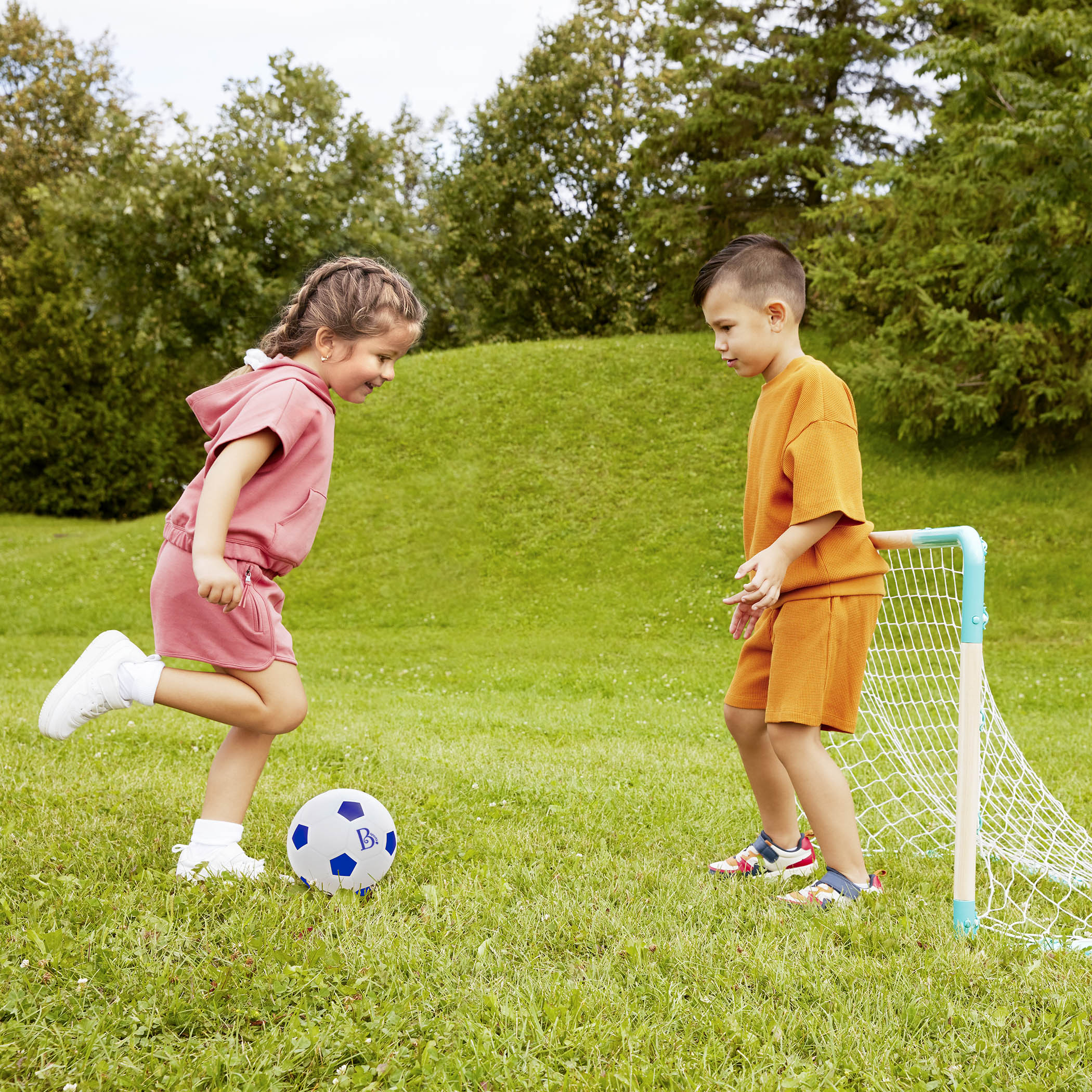 B. sports kids-sized soccer net and ball