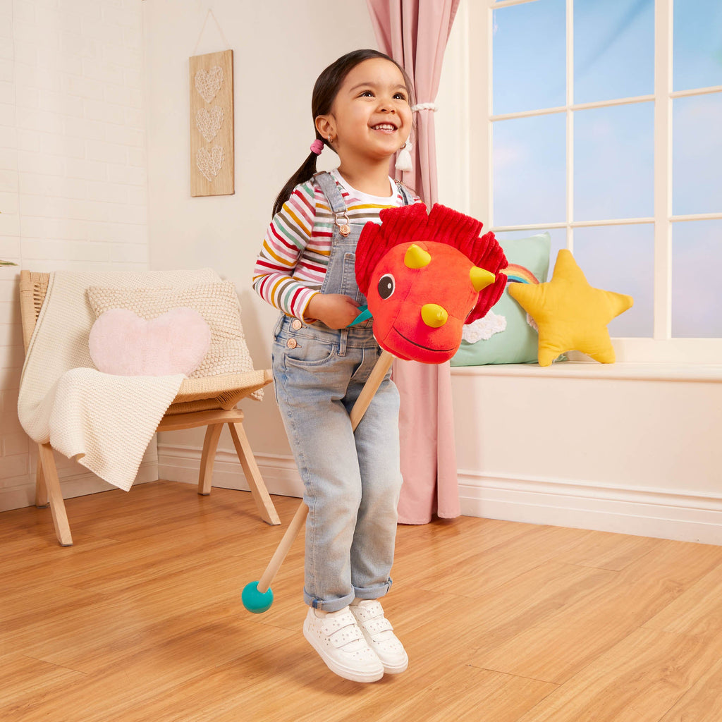 Plush dino hobbyhorse triceratops with wooden stick, sounds, and sensory textures