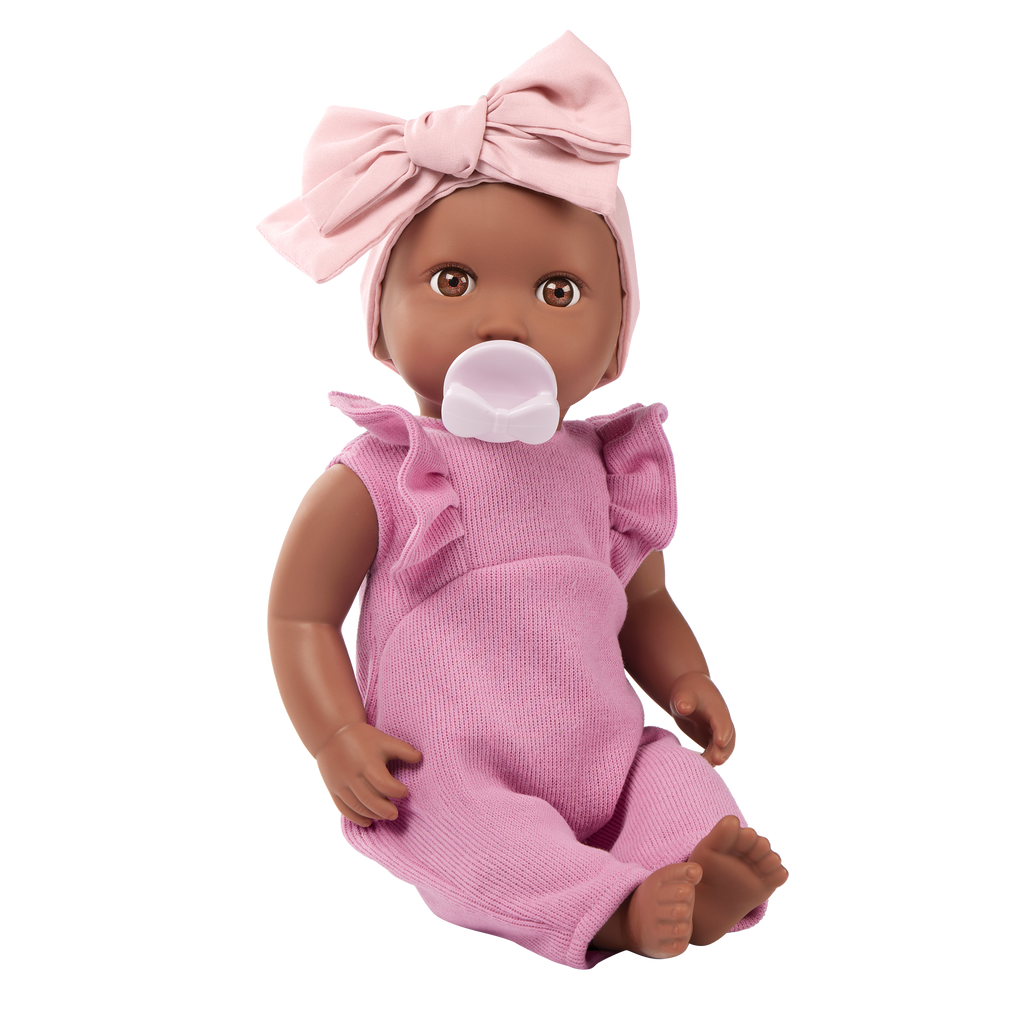 LullaBaby doll in purple romper